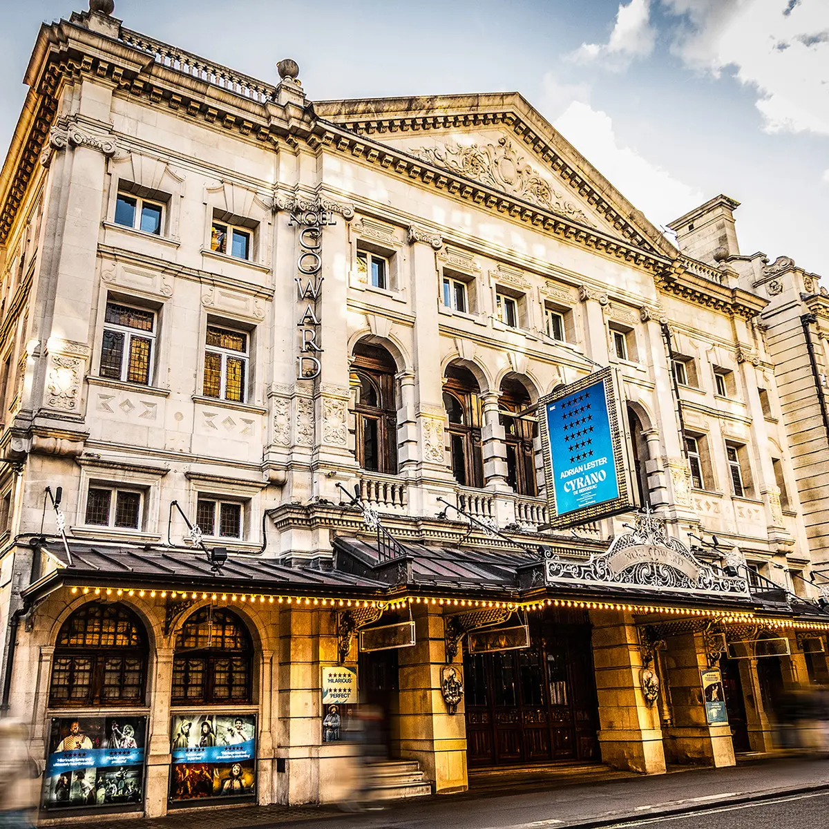 Noël Coward Theatre exterior with Cyrano de Bergerac signage