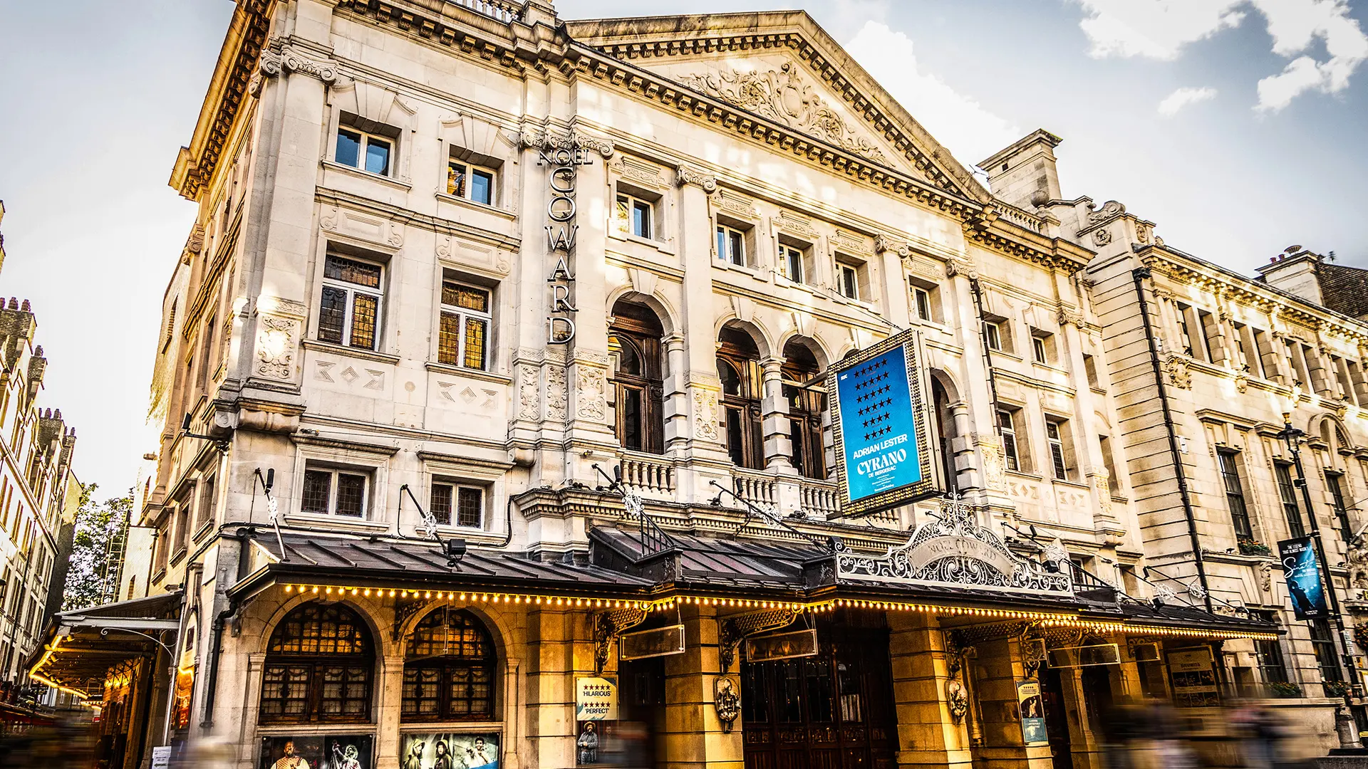 Noël Coward Theatre exterior with Cyrano de Bergerac signage